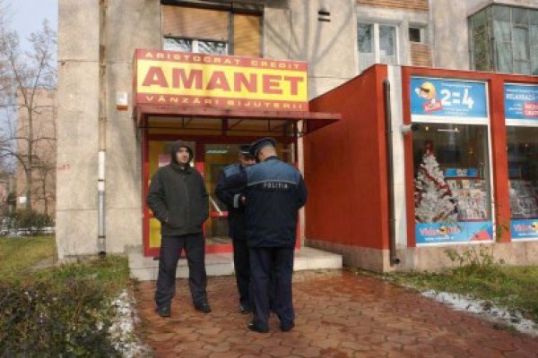 Firme de schimb valutar, călcate de mascaţi